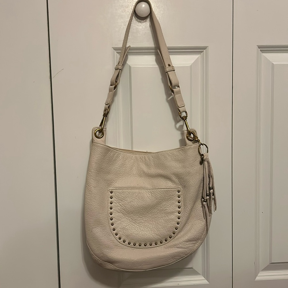 The Sak -- Leather antique white colored hobo bag w/brass tone hardware